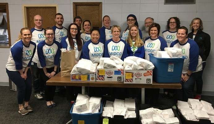 Midco employees at volunteer event for Lunch Is Served